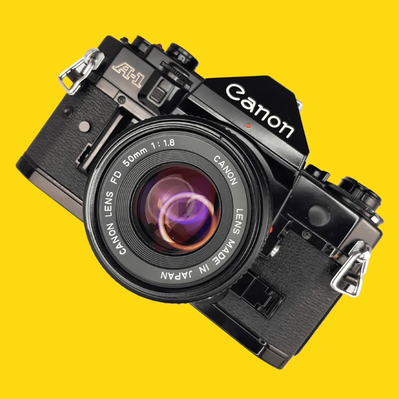 Canon A-1 Vintage SLR 35mm Film Camera with f/1.8 50mm Prime Lens