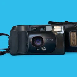 Canon Sure Shot Supreme 35mm Film Camera Point and Shoot with Black Leather Canon Case and ORIGNAL BOX