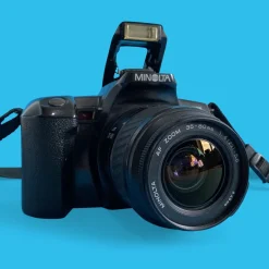 Minolta Dynax 303si AutomatIc SLR 35mm Film Camera with Auto Zoom Lens