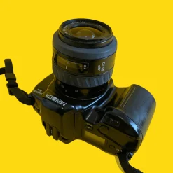 Minolta Maxxum 3xi Automatic 35mm SLR Film Camera with Auto Zoom Lens