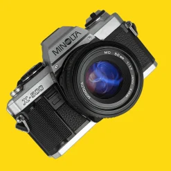 Minolta X-500 SLR 35mm Film Camera with Auto Zoom Lens
