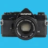 Olympus OM 1 Black Vintage 35mm SLR Film Camera with f/1.8 50mm Prime Lens