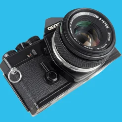 Olympus OM 1 Black Vintage 35mm SLR Film Camera with f/1.8 50mm Prime Lens