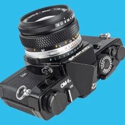 Olympus OM 1 Black Vintage 35mm SLR Film Camera with f/1.8 50mm Prime Lens