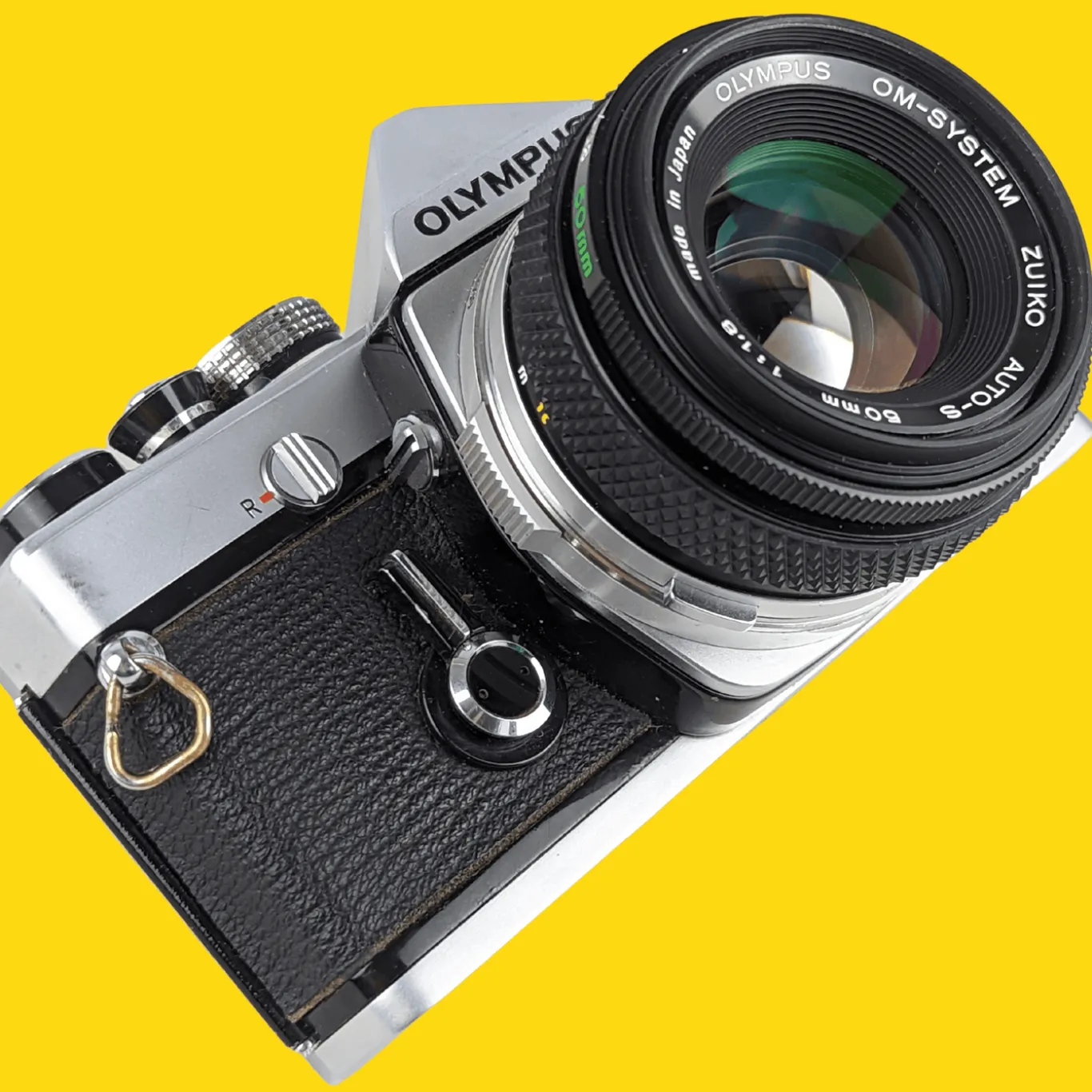 Olympus OM 1 Vintage 35mm SLR Film Camera with f/1.8 50mm Prime Lens