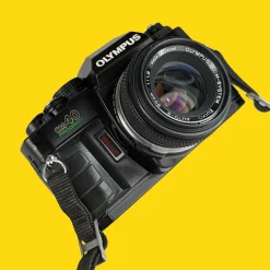Olympus OM40 Program Black 35mm SLR Film Camera with Olympus Prime Lens