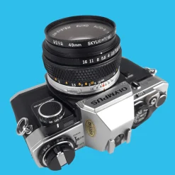 Olympus OM-10 SLR 35mm Film Camera w/ f/1.8 50mm Lens + Manual Adapter