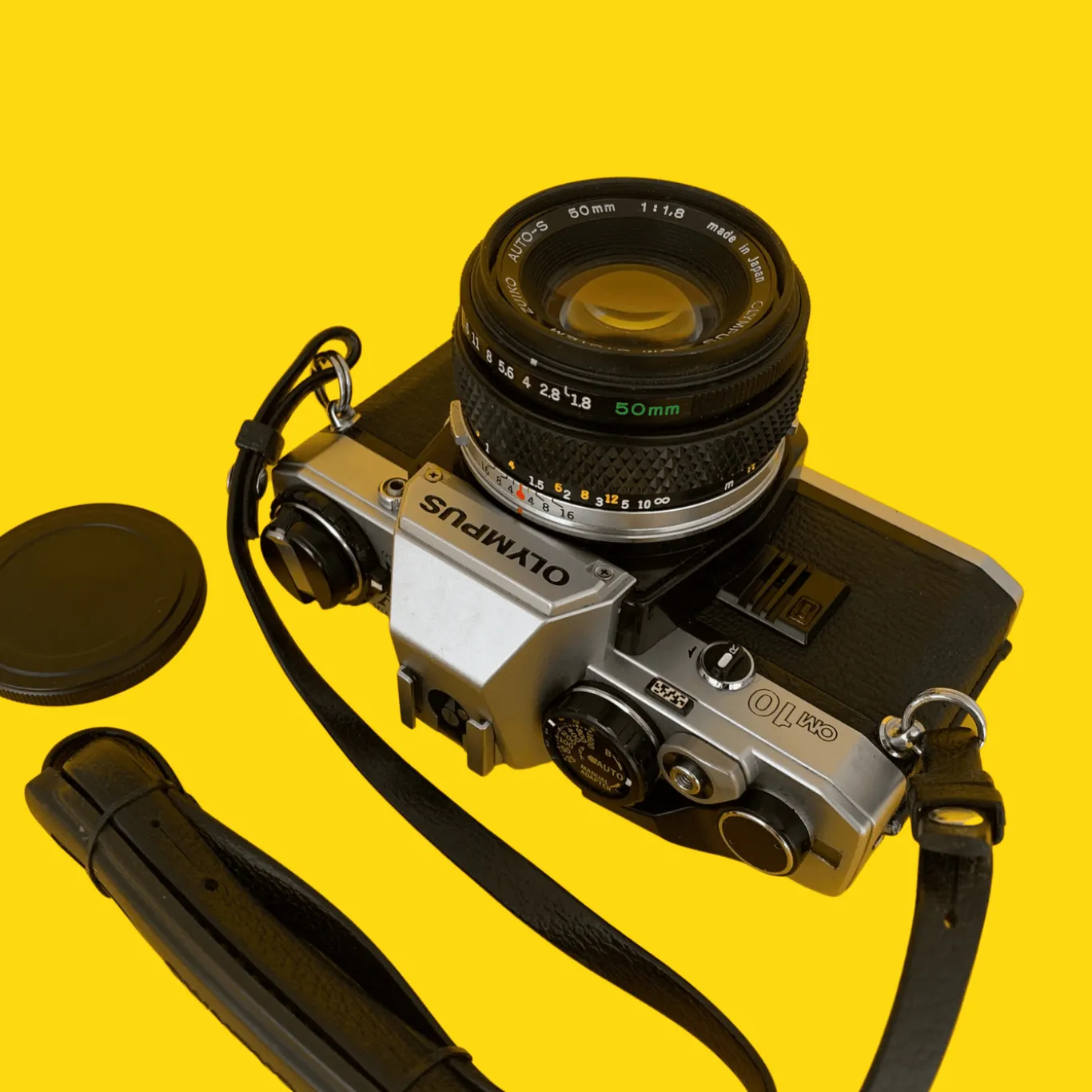 Olympus OM-10 Vintage SLR 35mm Film Camera with f/1.8 50mm Prime Lens