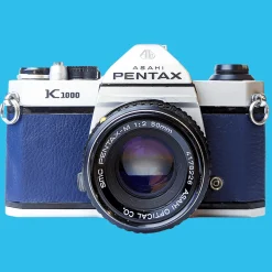 Pentax K1000 Navy Leather Vintage SLR 35mm Film Camera with Pentax f/2 50mm Prime Lens.