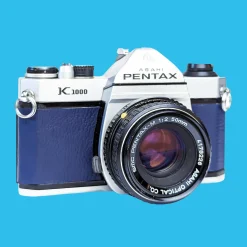 Pentax K1000 Navy Leather Vintage SLR 35mm Film Camera with Pentax f/2 50mm Prime Lens.