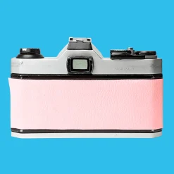 Pentax K1000 Pink Leather Vintage SLR 35mm Film Camera with Pentax f/2 50mm Prime Lens.