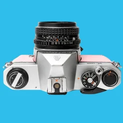 Pentax K1000 Pink Leather Vintage SLR 35mm Film Camera with Pentax f/2 50mm Prime Lens.